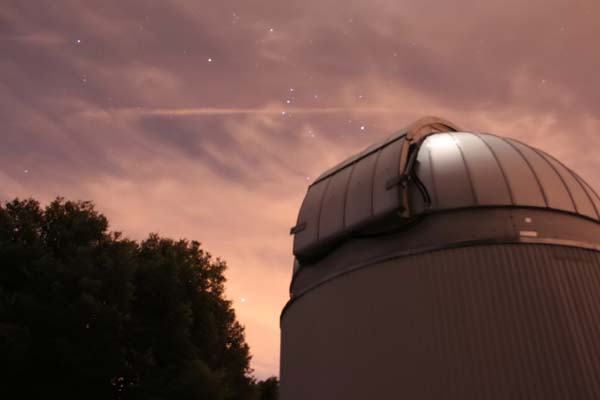 Sirius and Orion rising behind CHARA telescope (with moving clouds!)