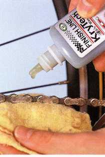 Oil the chain after riding in wet weather , and clean, dry, and lubricate when cleaning your bike. Except in winter, or in bad conditions, use light oil from a spray can or bottle. Hold a cloth underneath the chain to catch any excess oil.