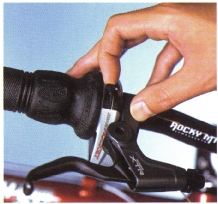 Put the rear shifter into the smallest cog and the front shifter into the smallest chainring.