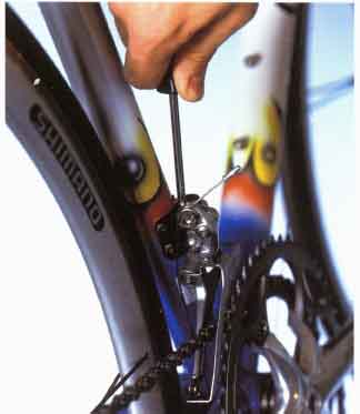 Pull the gear cable through the cable clamp and tighten the cable-clamp bolt. 